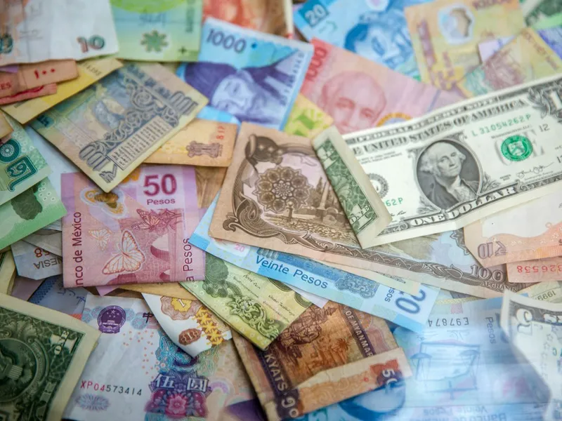 A mix of international banknotes.